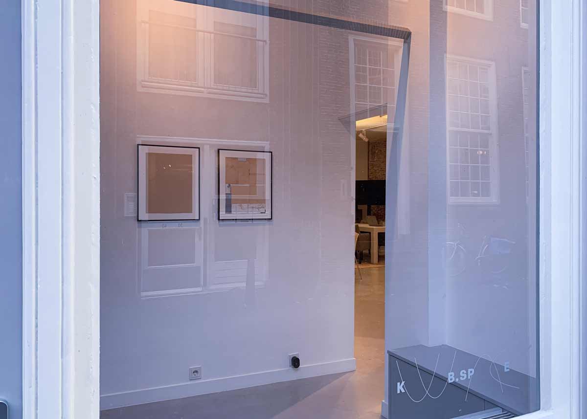 Installation view of Monochromaster Excavated #2 next to Excavation #2 in the window at KUUB